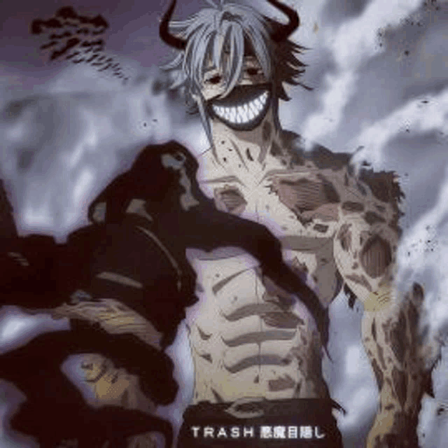 a man with horns and a mask on his face is standing in the smoke .