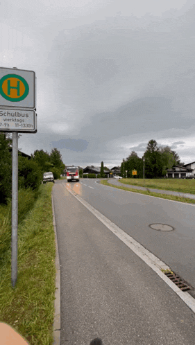 a sign on the side of a road says " schulbus "