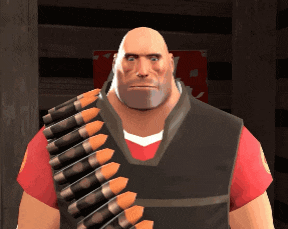 a bald man with a beard is wearing a red shirt and carrying a belt of bullets