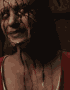 a close up of a nurse with blood on her face