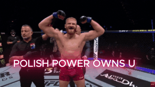 a man in a boxing ring with the words polish power owns u below him