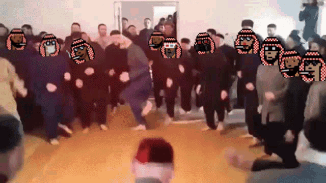 a group of people are dancing in a room with a man wearing a red hat with the letter r on it