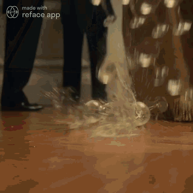 a light bulb is being thrown on the floor by a person
