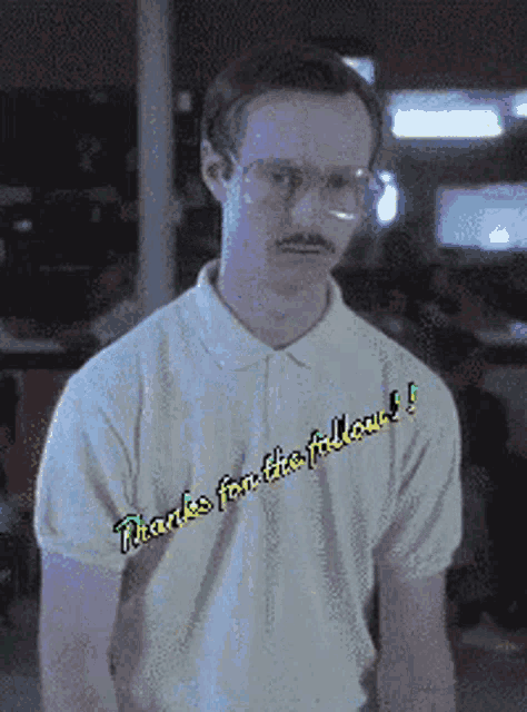 a man with glasses and a mustache is wearing a white shirt that says thanks for the follow