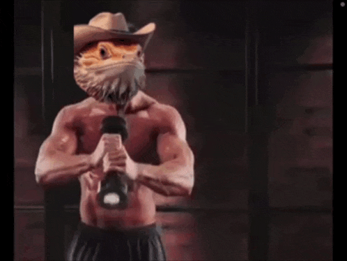 a shirtless man in a cowboy hat is holding a microphone