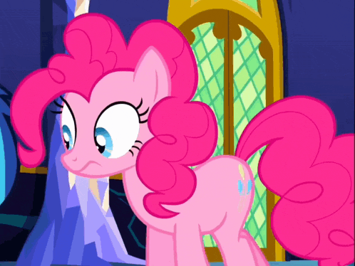 pinkie pie from my little pony is standing in a room
