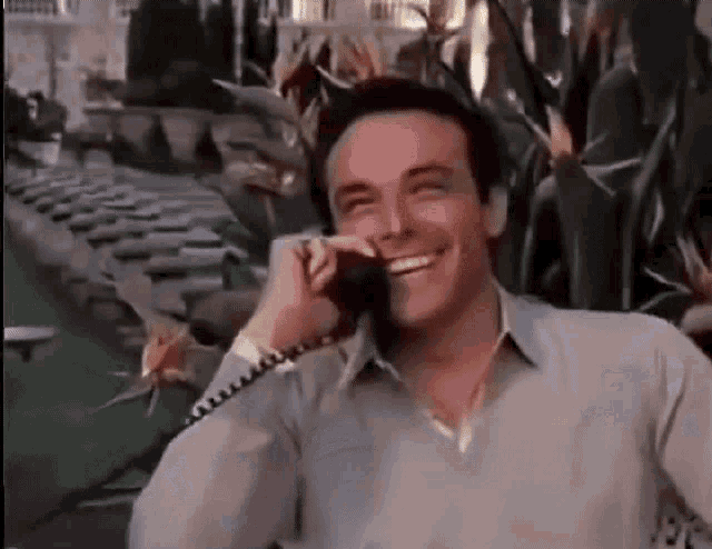 Scarface Phone Laughing GIF - Scarface Phone Laughing GIFs