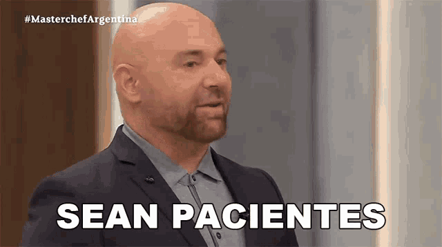 a man in a suit says sean pacientes on a television screen