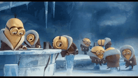 a group of minions are standing around a frozen igloo