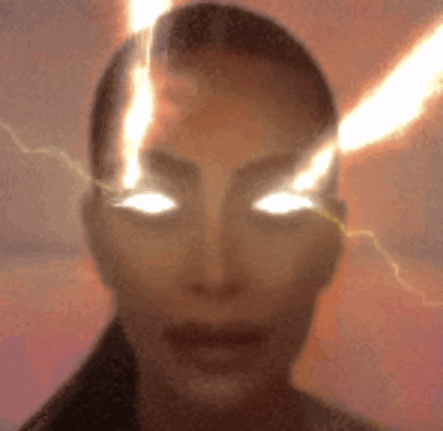 a close up of a woman 's face with lightning bolts coming from her eyes