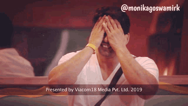 a man covering his face with his hands and the words presented by viacom 18 media pvt ltd 2019