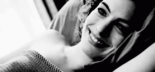 Anne Hathaway Smiling GIF - Anne Hathaway Smiling Happy GIFs