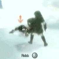 a gnome is standing in the snow with a sword and shield .