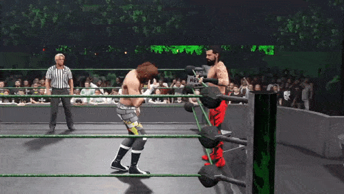 a video game shows two wrestlers in a ring with a referee watching