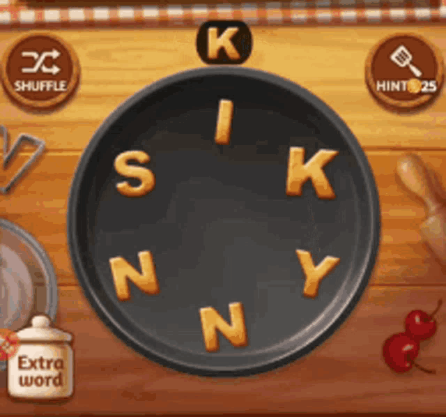 a pan with the letters s k i n y in it