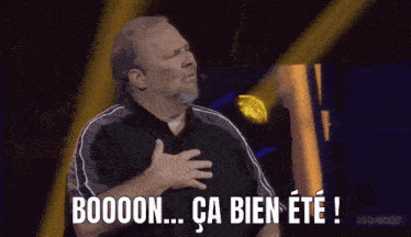 a man with his hand on his chest and the words boooon ca bien ete