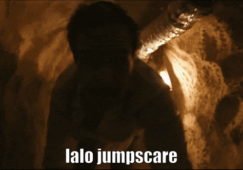 a man in a dark room with the words lalo jumpscare on the bottom right