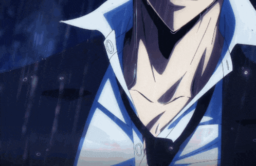 a close up of a man 's shirt and tie with the number 10 on the collar