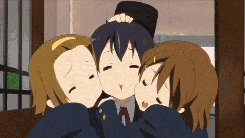 three anime characters are hugging each other and one of them is wearing a hat