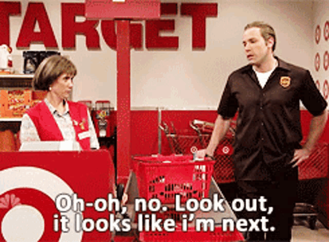 a man standing next to a woman in a target store
