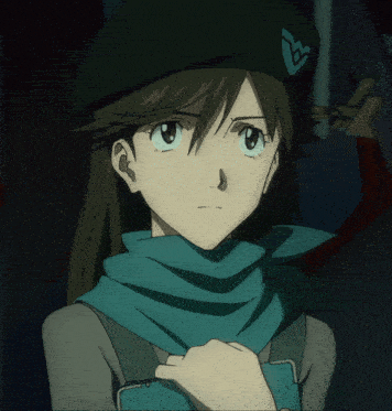 a girl with a scarf around her neck is wearing a beret with a triangle on it