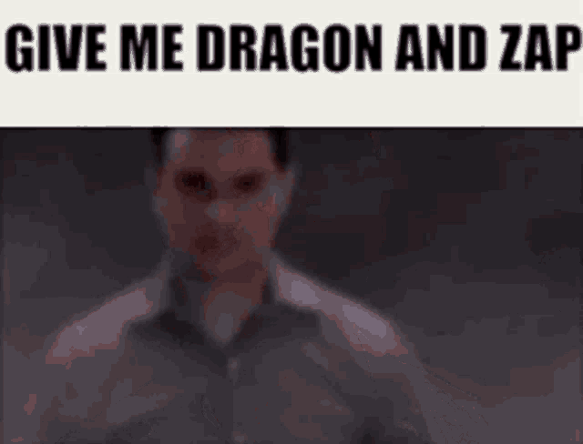 a blurred image of a man with the words " give me dragon and zap " below him