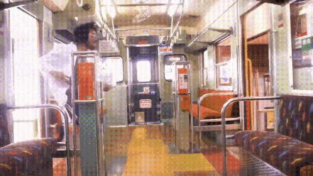 the inside of a bus with a sign on the door that says " emergency exit "