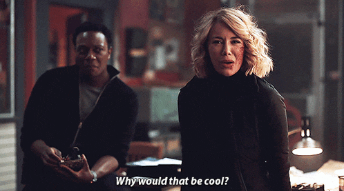 a man and a woman are standing next to each other and the woman is asking the man why would that be cool