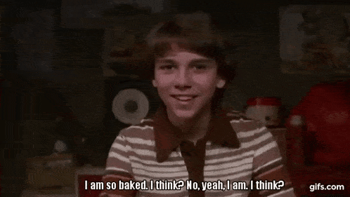 a young boy in a striped shirt and tie is saying `` i am so baked .