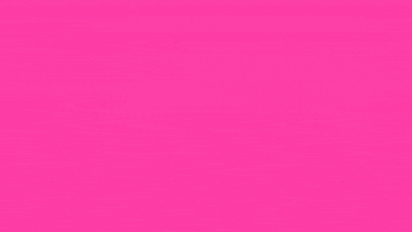 a cartoon girl is standing in front of a group of pink monsters .