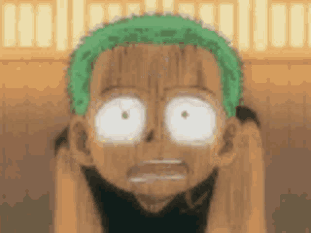 a close up of a cartoon character 's face with a green headband .