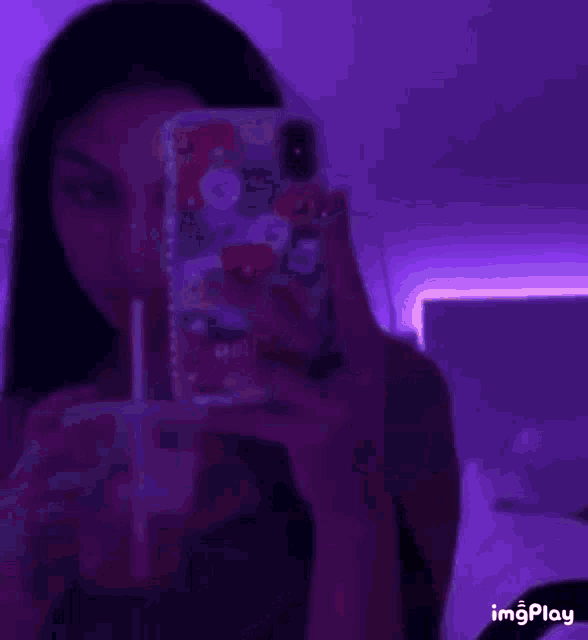 a purple background with the word divine written in neon