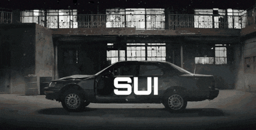 a car with the word sui on the side