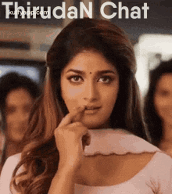a woman is making a funny face with her finger in her mouth and the words thirudan chat above her