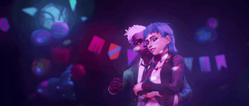 a man and a woman are hugging each other in a dark room .