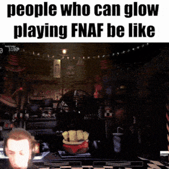 a man is playing a video game called five nights at freddy 's be like