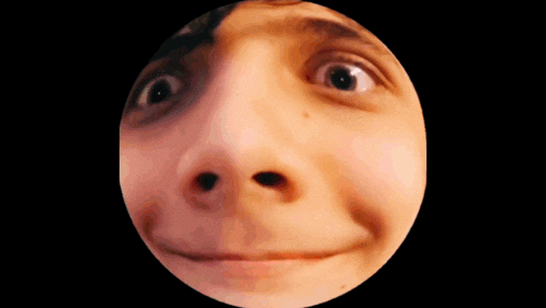 a close up of a person 's face with a circle around it