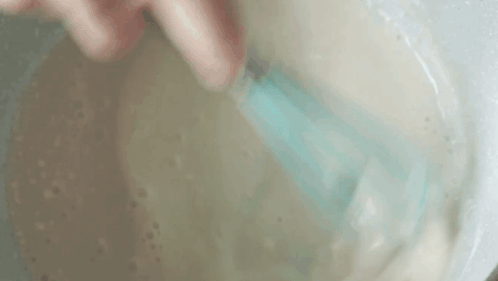 Mixing Two Plaid Aprons GIF - Mixing Two Plaid Aprons Stirring The Ingredients GIFs