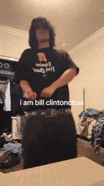 a man wearing a shirt that says i am bill clintonchan is dancing