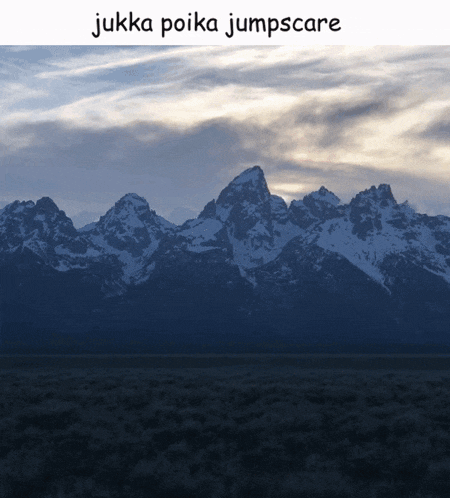 a picture of a mountain range with the words " jukka poika jumpscare " below it
