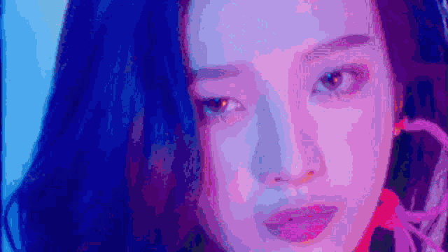 a close up of a woman 's face with the word hai written on it