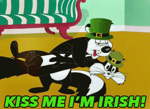 a cartoon of a dog and a cat with the words kiss me i 'm irish on the bottom