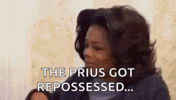 a woman is holding a baby and says `` the prius got repoussed ... ''