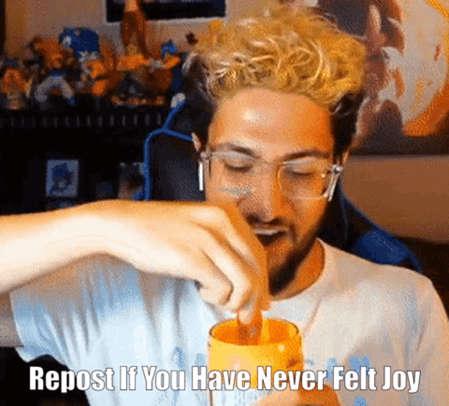 a man with glasses is pouring something into a cup with the words repost if you have never felt joy below him