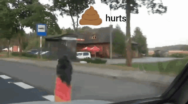 a sticker on a car windshield says hurts