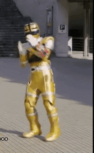 a person in a yellow costume is standing in front of a parking sign