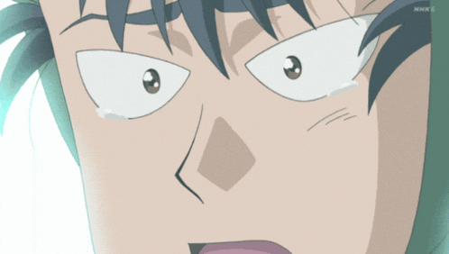 a close up of a person 's face with their eyes closed and the letters nhke on the bottom right