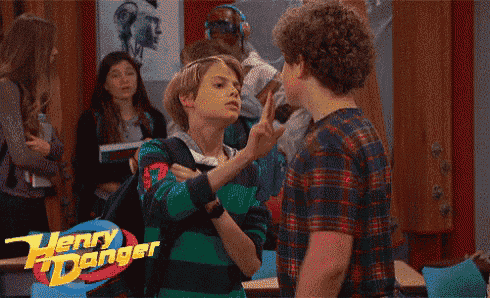 a henry danger logo can be seen in the background of a scene