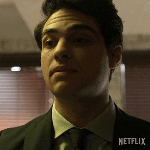 a close up of a man 's face with a netflix logo below him
