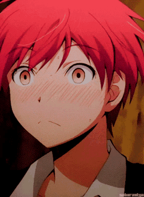 a close up of a red haired anime character with a blurry background
